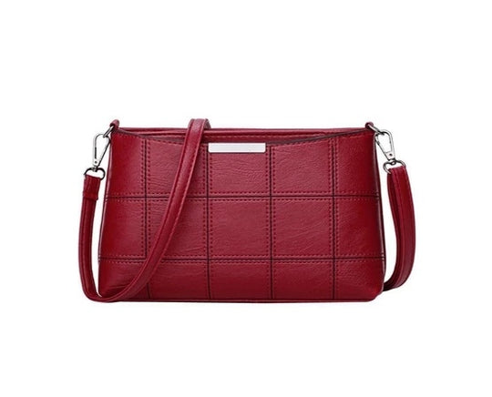 Clutched splicing soft leather crossbody bag