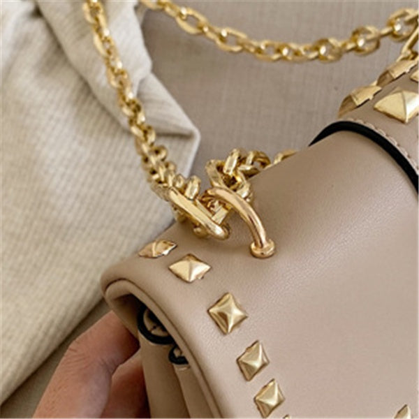Chain stud shoulder bag