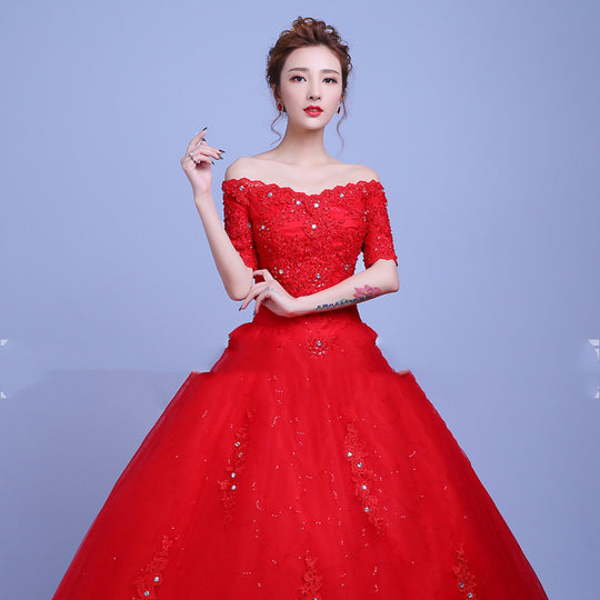 Red trailing one-shoulder wedding dress
